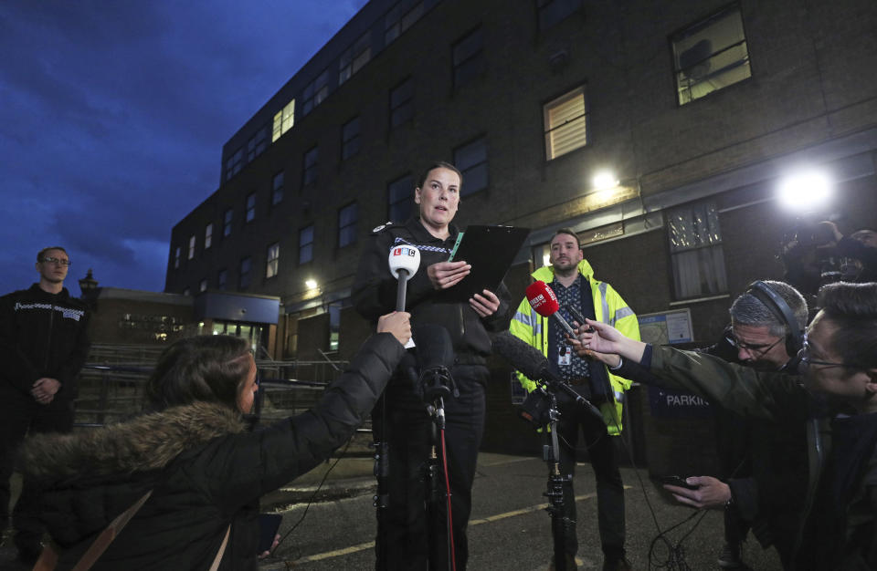 Deputy Chief Constable Pippa Mills speaks to the media during a press conference at Grays Police Station in Essex Friday, Oct. 25, 2019, after a man and a woman, both aged 38 and from Warrington, have been arrested on suspicion of manslaughter and conspiracy to traffic people in connection with the 39 bodies found in a lorry in Essex on Wednesday. ( Jason Roberts/PA via AP)