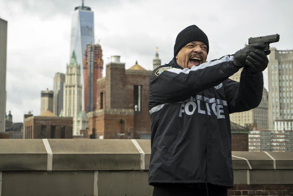 Ice-T points a handgun in front of himself in an episode of Law and Order: Special Victims Unit. (Michael Parmelee / Getty Images)