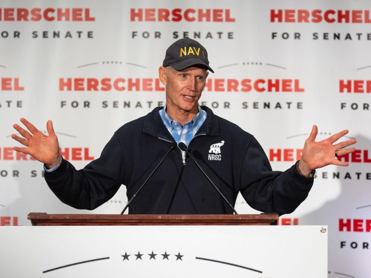 NRSC chairman Sen. Rick Scott, R-Fla., introduces Senate candidate Herschel Walker at his campaign rally in Athens, Ga., on Saturday, November 5, 2022.