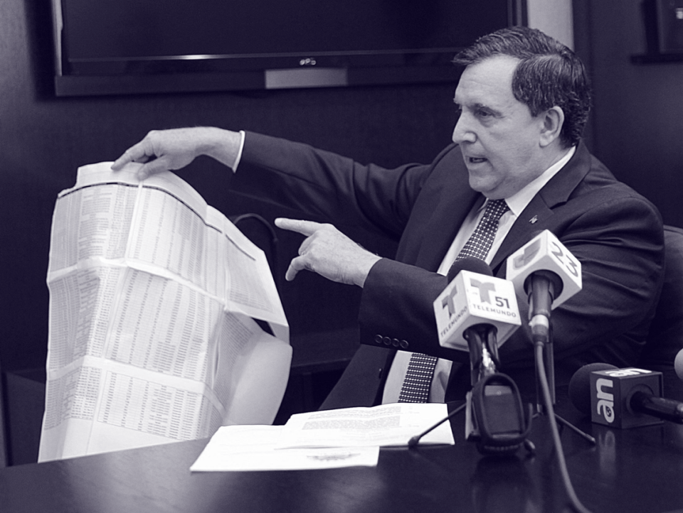 Joe Carollo, then Doral city manager, displayed some papers as evidence as he talked for more than hour during a press conference in which he accused council members of corruption and secret deals to fire him. This occurred in April 2014. Pedro Portal/El Nuevo Herald
