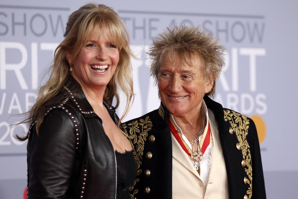 Rod Stewart and Penny Lancaster pose for photographers upon arrival at Brit Awards 2020 in London, Tuesday, Feb. 18, 2020.(Photo by Vianney Le Caer/Invision/AP)