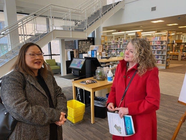 Mary Ellen Icaza (left) and Stephanie Cargill (right) explain upcoming changes to the Plain Community Branch library. The facility will close Monday until August.