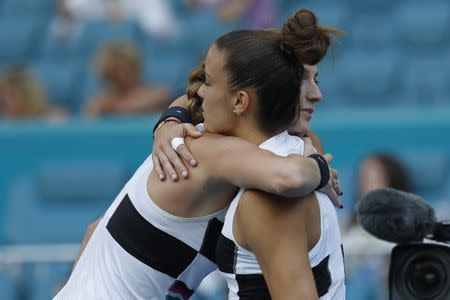 Mar 21, 2019; Miami Gardens, FL, USA; Petra Kvitova of Czech Republic (L) hugs Maria Sakkari of Greece (R) after their match in the first round of the Miami Open at Miami Open Tennis Complex. Geoff Burke