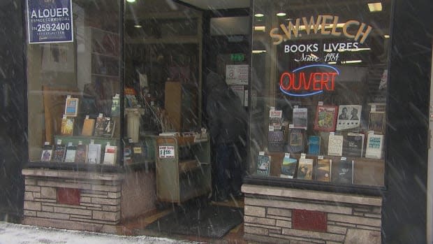 The storefront of S. W. Welch bookstore now has a 'for rent' sign in the window.