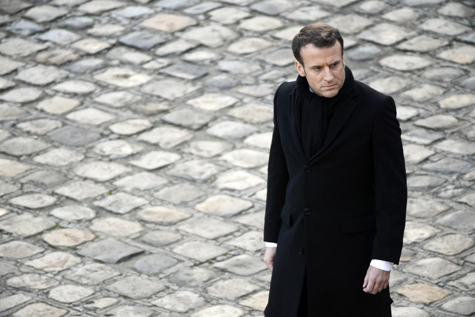 French President Emmanuel Macron attends an award ceremony at the Invalides Monument, Monday Dec. 9, 2019 in Paris. (Ludovic Marin/Pool via AP)