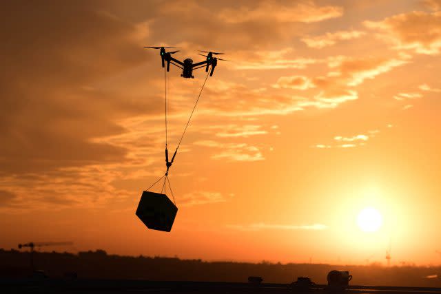 A drone, demonstrating the carrying of medical supplies