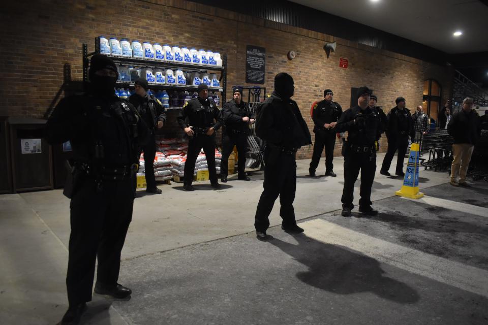 Many law enforcement officers stood outside of the Johnson City Wegmans Wednesday night as protesters gathered in the wake of the beating death of Tyre Nichols in Memphis by police officers, and arrest of Binghamton resident Hamail Waddell in the early hours of New Year's Day.