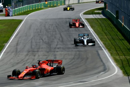 Sebastian Vettel leads Lewis Hamilton and Charles Leclerc during the Canadian Grand Prix