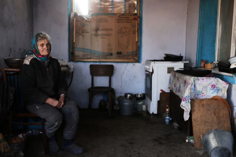 The Wider Image: Elderly brothers eke out life among ruins of Ukraine war