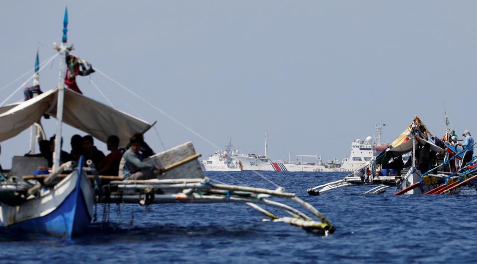 Philippines fishing China coast guard South China Sea Scarborough Shoal
