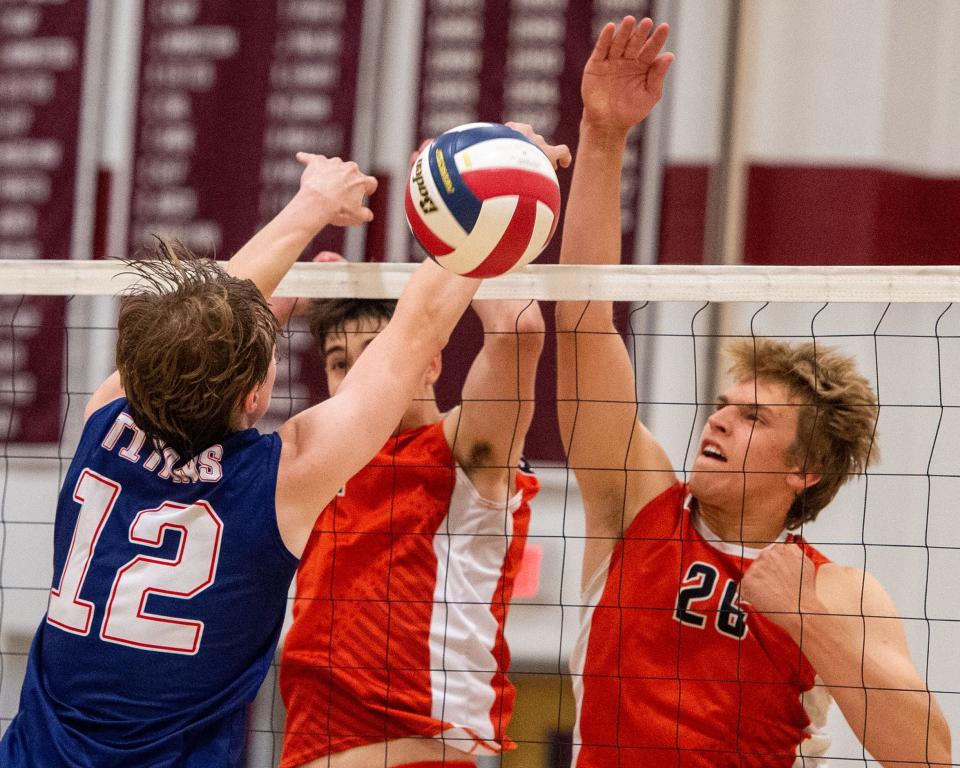 Central York’s Christian Bucks (26) hits a spike past the block of Shaler’s Logan Petterson in a PIAA Class 3A semifinal in Altoona on Tuesday, June 13, 2023. Shaler won 3-0.