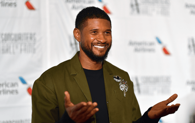 <p>Angela Weiss/AFP via Getty Images</p> Usher