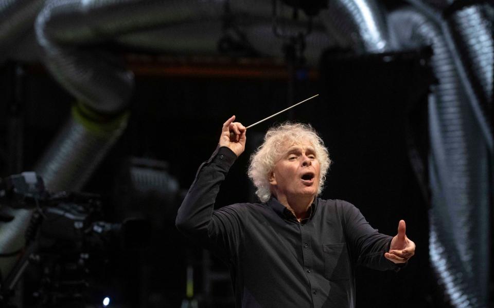 Sir Simon Rattle conducting the City of Birmingham Symphony Orchestra - Julian Simmonds