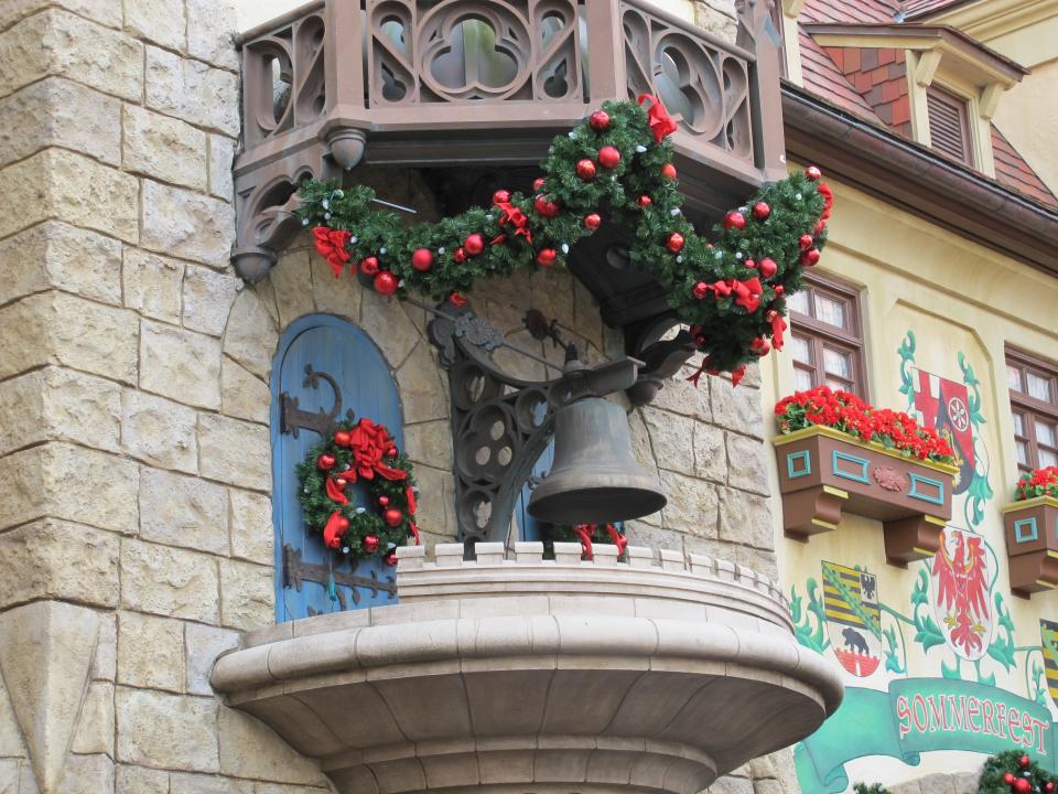 Do you see Mickey on the clock tower above the Biergarten?