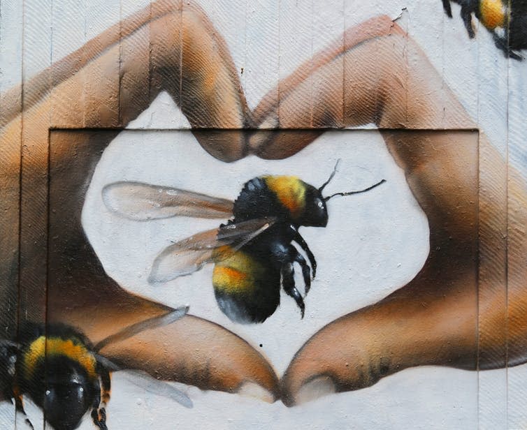 <span class="caption">A mural of the Manchester bee, which came to symbolise the city’s togetherness after the bomb in the Northern Quarter.</span> <span class="attribution"><a class="link " href="https://www.flickr.com/photos/levien66/34912758382/in/photolist-Vc81J3-4HLxxq-oD4wvh-omBcJc-oB4oFf-5hfDqV-TjFThF-6qxF1N-oB4mHN-8dH99G-ieJnpw-8dH9wj-aB6Nro-ai4NB-5g8Chw-omBaDv-4TPp54-8dH7nJ-oD4rvN-oD67Hr-5oJk8p-fKKqoN-8F1xiD-oCSybW-aS72Gv-oCPuAT-oB4qjW-ssLn1o-81DCo9-invrW4-oCPqFi-omAoJd-8dHaAN-omArK3-7qbVBa-8AfnGT-255u8W6-omAGSB-6mYHqq-aB47sc-3dSYEF-8zBheX-oB4r91-aTgUAn-W9m5vy-8dDW3a-7Dwuk6-omBc2a-omAq8L-8dH8yQ" rel="nofollow noopener" target="_blank" data-ylk="slk:Transport Pixels;elm:context_link;itc:0;sec:content-canvas">Transport Pixels</a>, <a class="link " href="http://creativecommons.org/licenses/by/4.0/" rel="nofollow noopener" target="_blank" data-ylk="slk:CC BY;elm:context_link;itc:0;sec:content-canvas">CC BY</a></span>