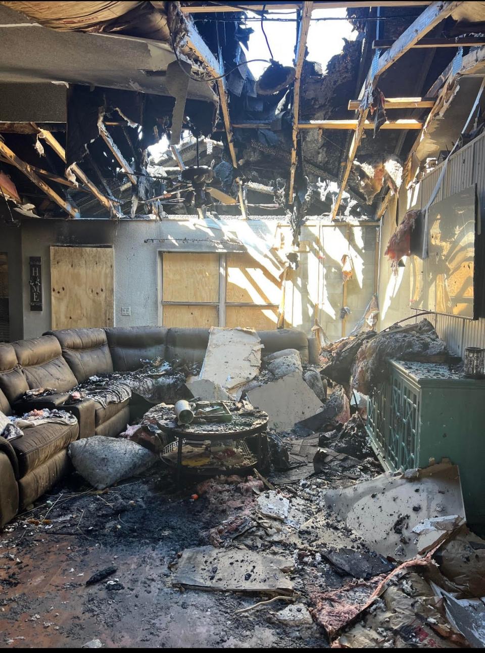 Damage to the living room in the Deep Creek home of Tony and Leighann Miller.