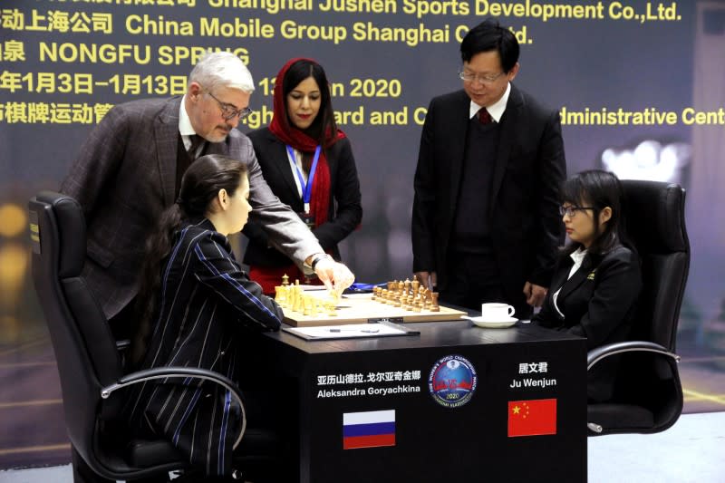 Iran chess referee Shohreh Bayat wearing hijab looks on during the Women's World Chess Championship in Shanghai