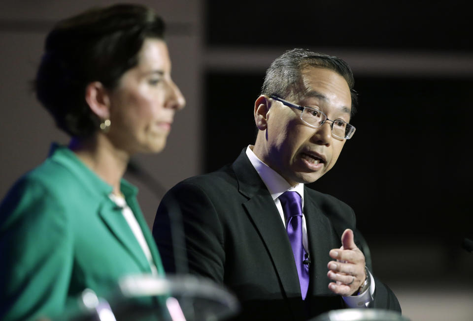 Rhode Island gubernatorial candidates Democratic Gov. Gina Raimondo, left, and Republican Cranston Mayor Allan Fung, right, participate in a televised debate, Thursday, Sept. 27, 2018, in Bristol, R.I. (AP Photo/Steven Senne)