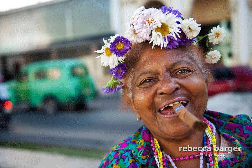 A Cuban woman is shown at the Paseo del Prado in Havana. This promenade is the dividing line between Old Havana and Central Havana. This Cuban woman will let you take her photo and she hopes you'll tip her with soap, which, apparently, is quite a luxury.