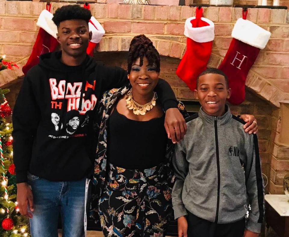 Monica Johnson with her sons, Caleb (left), who is 17, and Isaiah (right), who is 13.