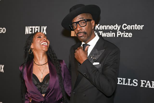 <p>ROBERTO SCHMIDT/AFP via Getty</p> J.B. Smoove (R) and his wife Shahidah Omar