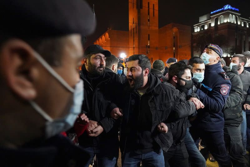 People attend an opposition rally in Yerevan