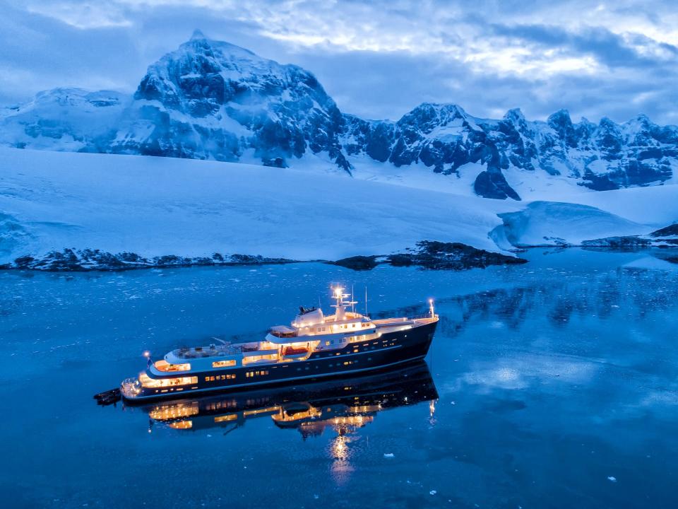 A ship going by icy land