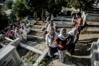 The mother of a victim of the suicide bomb attack in Suruc on July 22, mourns during her son's funeral on August 4, 2015 in Istanbul