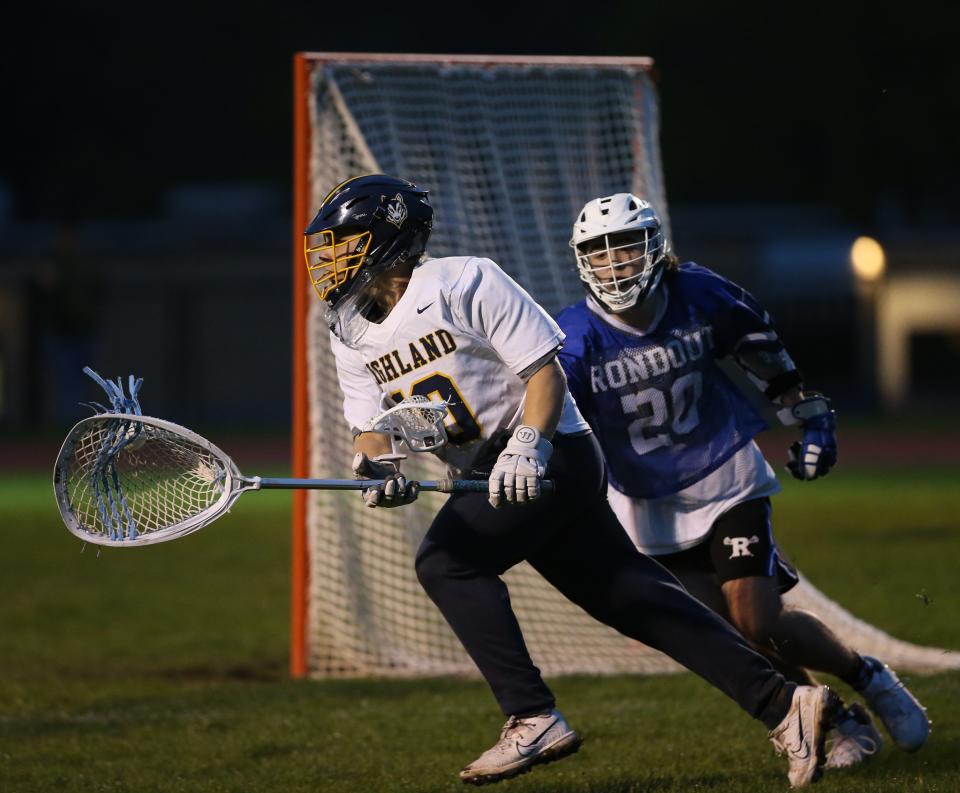 Highland's goalie, Landon Zehr clears the ball away from Rondout Valley's Clifford Bush during Monday's game on April 17, 2023.