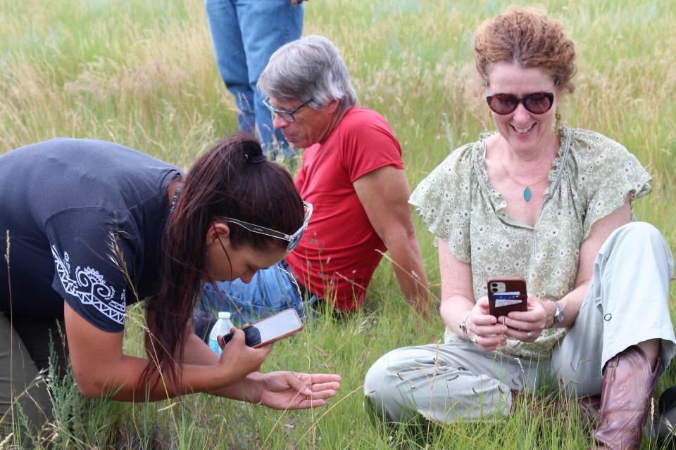 BLM Director Tracy Stone-Manning (right) enjoys a casual moment while researchers from the Seeds of Success program record the grasses of the Fort Belknap Indian Reservation