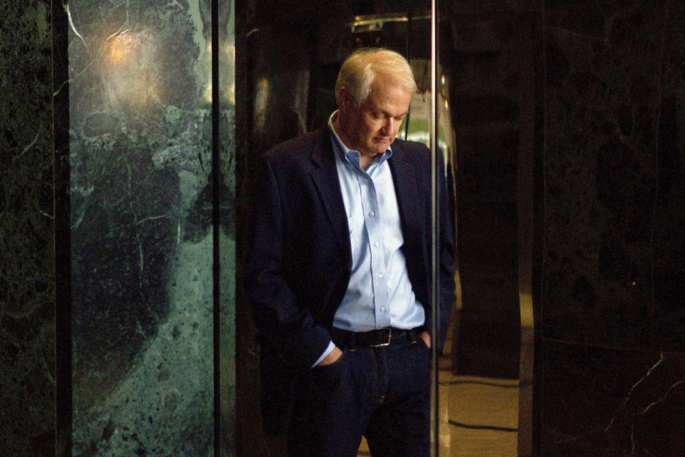 FILE - In this Aug. 23, 2012, file photo, Donald Fehr, executive director of the National Hockey League Players' Association, is reflected in the doors of an elevator as he prepares to speak with the media following labor talks with the NHL in Toronto. The NHLPA announces its decision whether to terminate the current collective bargaining agreement and set the clock ticking toward another potential work stoppage in 2020. (AP Photo/The Canadian Press, Chris Young, File)