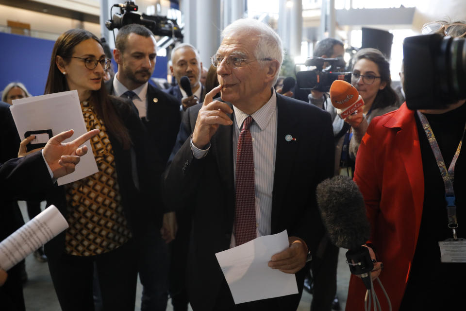 European Union foreign policy chief Josep Borrell is surrounded by reporters at the European parliament Tuesday, Jan.14, 2020 in Strasbourg, eastern France. Britain, France and Germany have launched action under the Iran nuclear agreement paving the way for possible sanctions in response to Tehran's attempts to roll back parts of the deal, European Union foreign policy chief Josep Borrell said Tuesday. (AP Photo/Jean-Francois Badias)