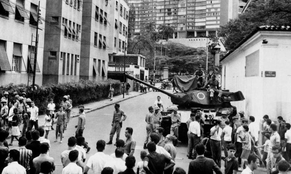 Brazilian army tanks stand in front of Laranjeiras Palace, on 1 April 1964.