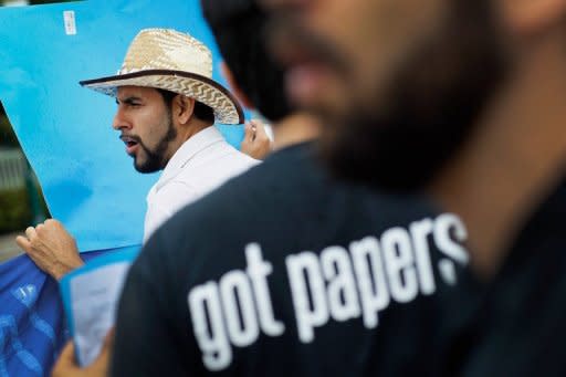 Protestors demonstrate against US immigration policy in Florida on May 31. The United States announced it will stop deporting young illegal immigrants who satisfy broad criteria, in a move that will be seen as a concession to the Hispanic community ahead of November's election