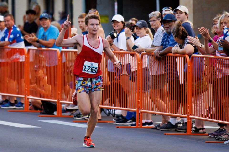 Overall winner Sam Duncan crosses the line in the Bluegrass 10,000. Duncan, who is from Ohio, runs cross country at the University of Dayton.