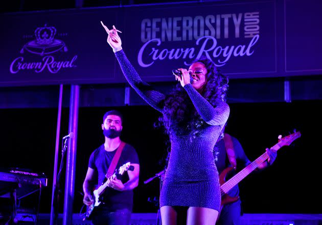 R&B singer-songwriter Ari Lennox performs at the Crown Royal #GenerosityHour to give back to Washington Heights hospitality workers at The Hudson on June 15 in New York City. (Photo: Noam Galai via Getty Images for Crown Royal)