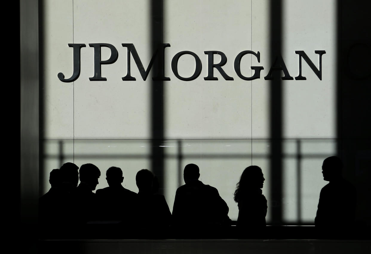 FILE - In this Monday, Oct. 21, 2013, file photo, the JPMorgan Chase logo is displayed at their headquarters in New York. JPMorgan Chase said Tuesday, July 13, 2021,  its second quarter profits more than doubled from a year ago — a reflection of the improving global economy and fewer bad loans on its balance sheet. (AP Photo/Seth Wenig, File)