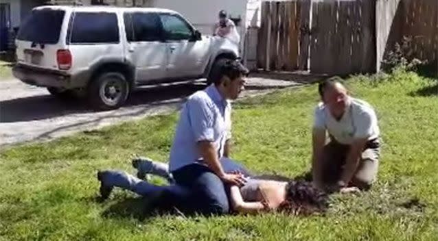 The salesman and another man catch the woman and detain her until police arrive. Picture: YouTube