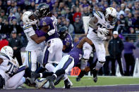 <p>Melvin Gordon #28 of the Los Angeles Chargers scores a one yard touchdown against the Baltimore Ravens during the fourth quarter in the AFC Wild Card Playoff game at M&T Bank Stadium on January 06, 2019 in Baltimore, Maryland. (Photo by Rob Carr/Getty Images) </p>