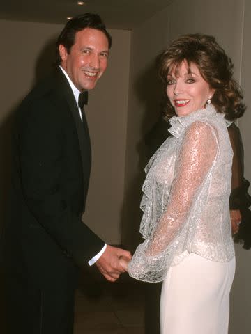 Ron Galella/Ron Galella Collection/Getty Joan Collins and husband Percy Gibson together in 2002, the year they tied the knot.