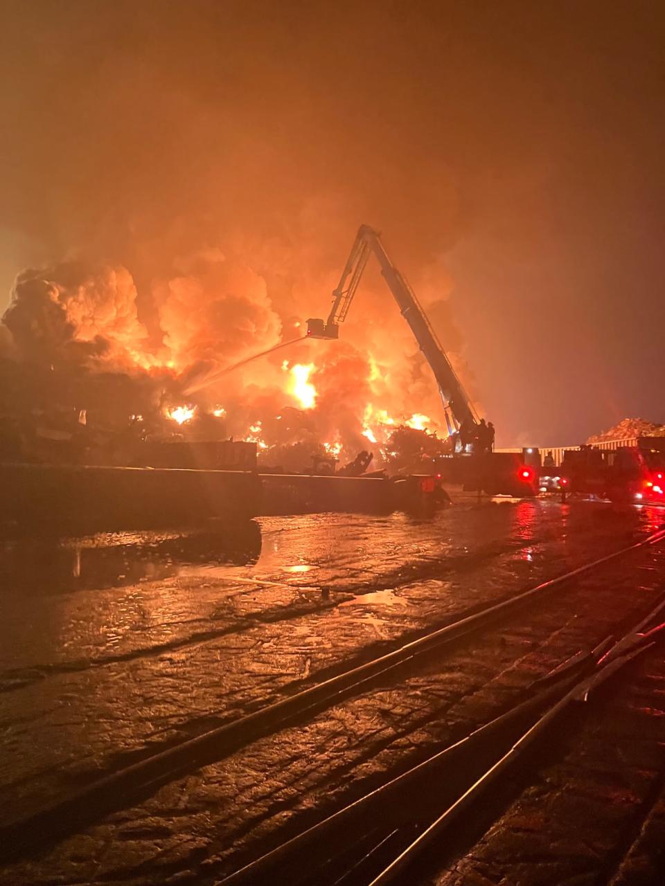 Piles of scrap metal caught fire at around 1 a.m. Thursday. As of 8 a.m., crews were still trying to knock the fires down. (Submitted by Ed Moyer - image credit)
