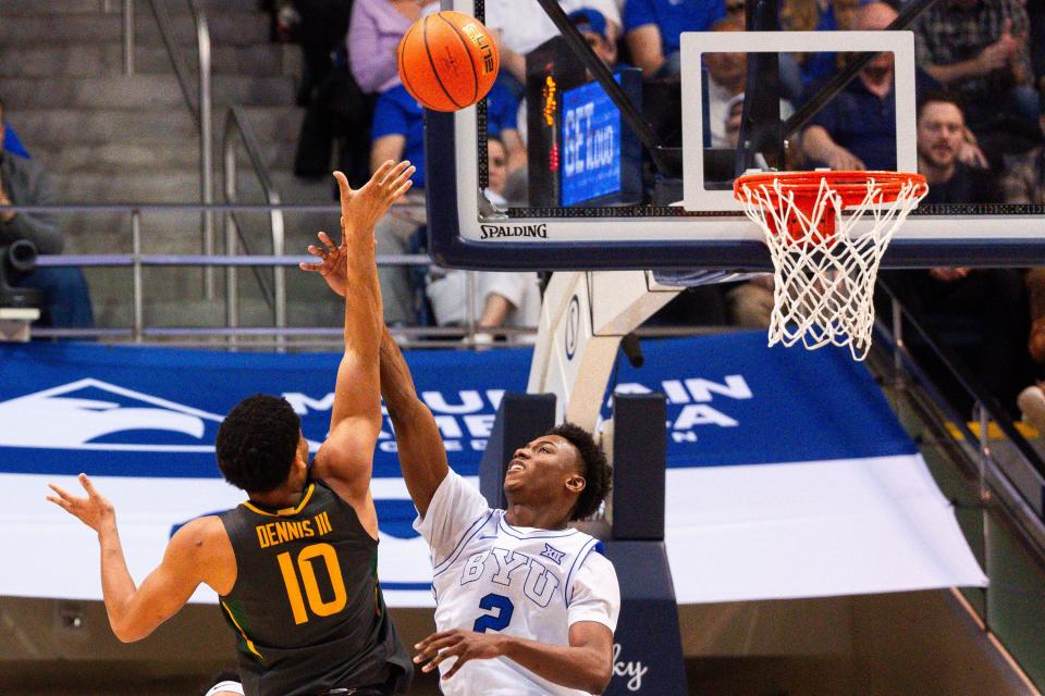 Baylor Bears guard RayJ Dennis (10) shoots the ball with Brigham Young Cougars guard Jaxson Robinson (2) on defense during a men’s college basketball game between Brigham Young University and Baylor University at the Marriott Center in Provo on Tuesday, Feb. 20, 2024. | Megan Nielsen, Deseret News