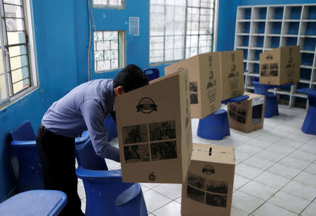 A man casts his vote in a school used as a polling station during the presidential election, in Guayaquil, Ecuador April 2, 2017. REUTERS/Henry Romero