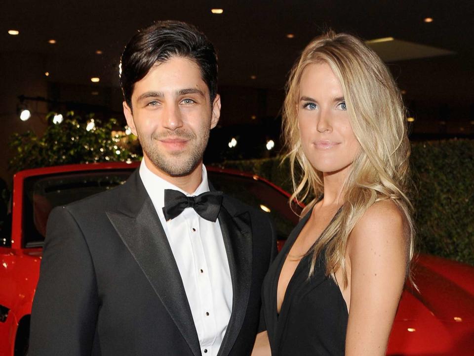 Josh Peck (L) and Paige O'Brien with the Jaguar F-TYPE Convertible at the 2014 BAFTA LA Jaguar Britannia Awards with Jaguar North America at The Beverly Hilton Hotel on October 30, 2014 in Beverly Hills, California