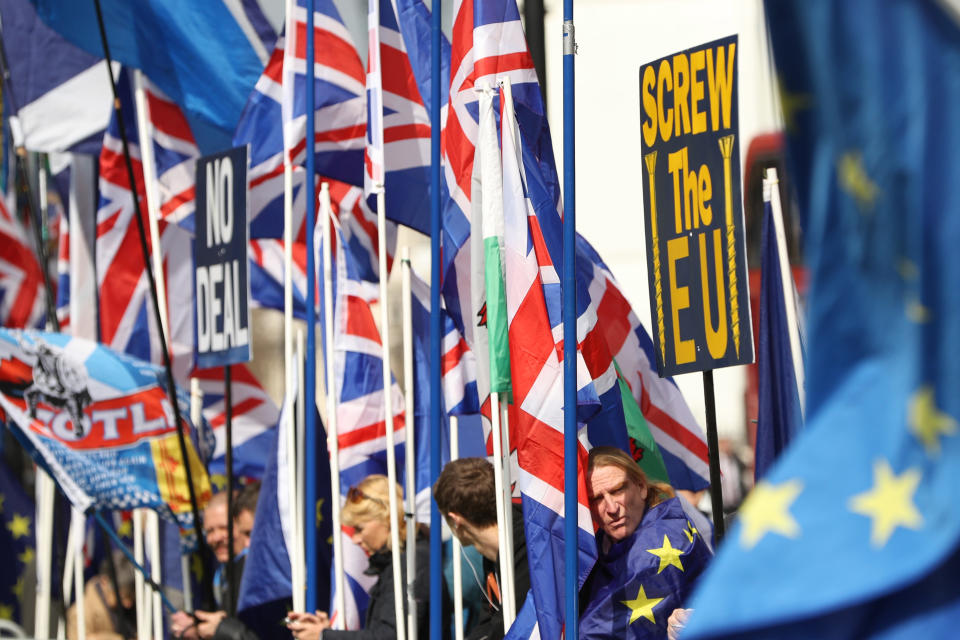 <p>A sea of flags outside Westminster (GETTY) </p>