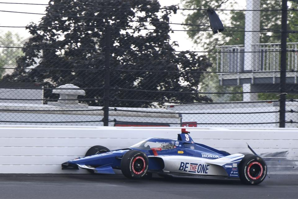 Linus Lundqvist, of Sweden, wrecks during a practice session for the Indianapolis 500 auto race at Indianapolis Motor Speedway, Thursday, May 16, 2024, in Indianapolis. (AP Photo/Jamie Gallagher)