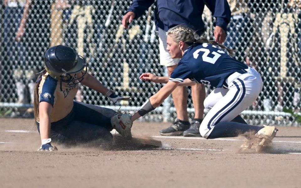 Bald Eagle Area’s Sydney Thompson safely steals third under the tag of Penns Valley’s Elle Dinges during the game on Friday, May 24, 2024.