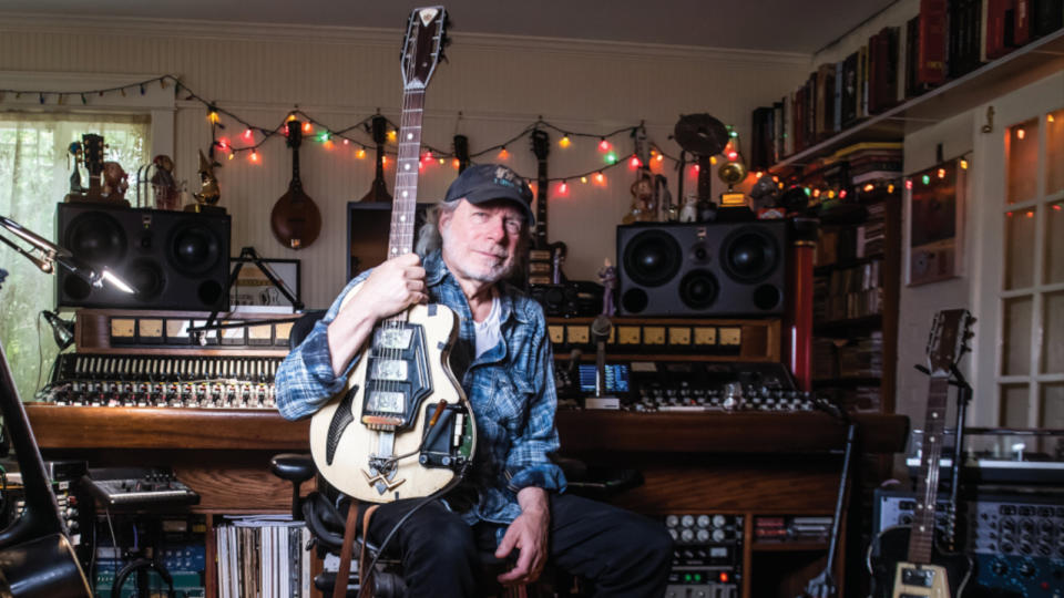 Miller in his home studio with one of his two Wandré electric guitars