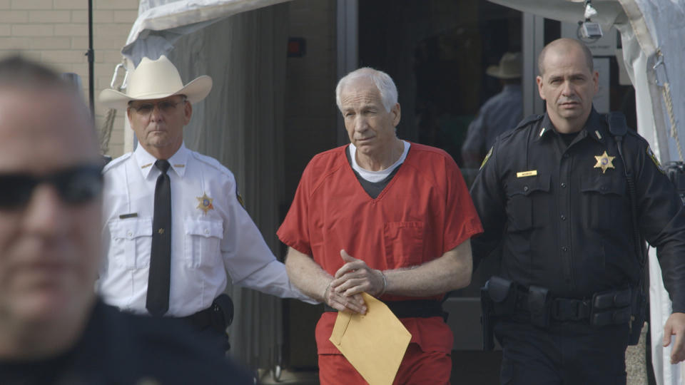 This photo provided by the Sundance Institute shows Jerry Sandusky, center, in the documentary film, "Happy Valley," by director Amir Bar-Lev. The Sundance Film Festival runs Jan. 16-26, 2014, in Park City, Utah. (AP Photo/Sundance Institute, Asylum Entertainment)
