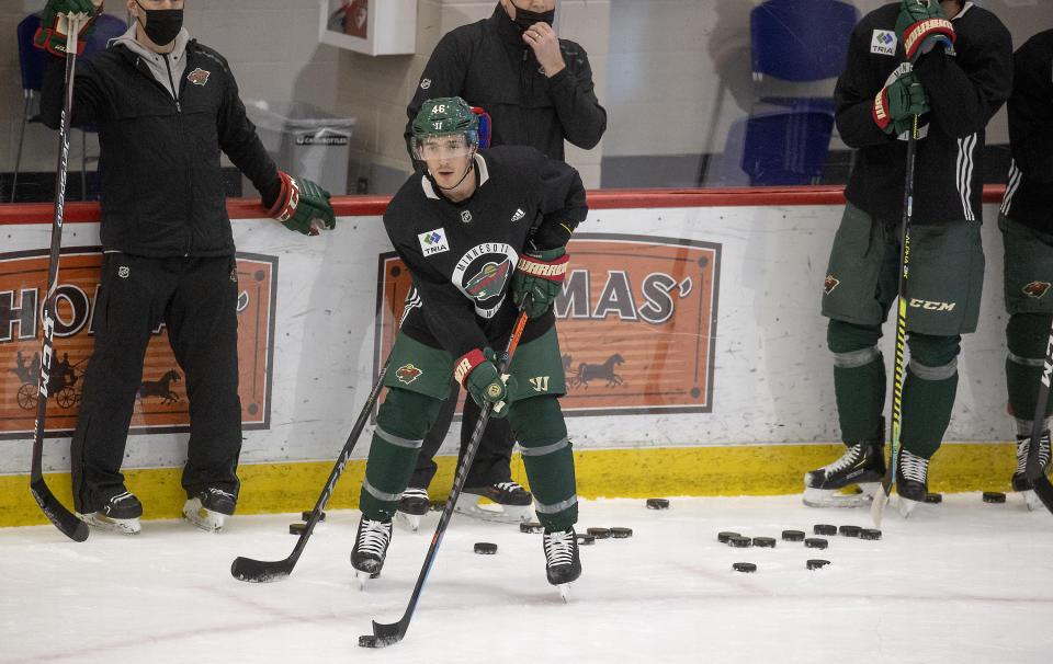 Minnesota Wild defenseman Jared Spurgeon takes to the ice during NHL hockey training camp Monday, Jan. 4, 2021, in St. Paul, Minn. (Elizabeth Flores/Star Tribune via AP)